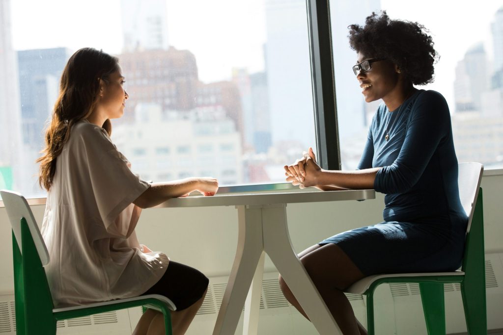cognitive behavior therapy. Two woman talking.