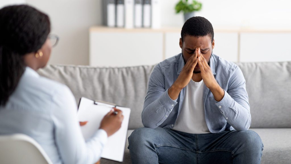 Trauma and PTSD counselling. Man frustrated