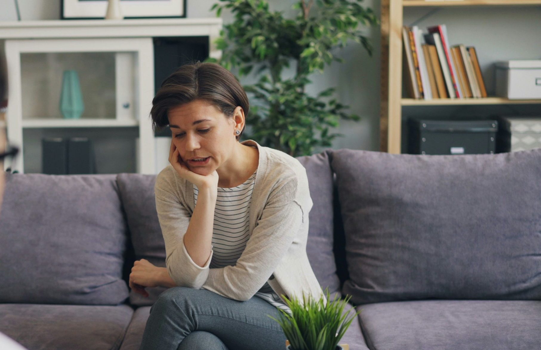 Trauma-Focused Therapy. Woman on sofa.