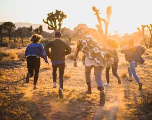 Group of Teenagers Running outside